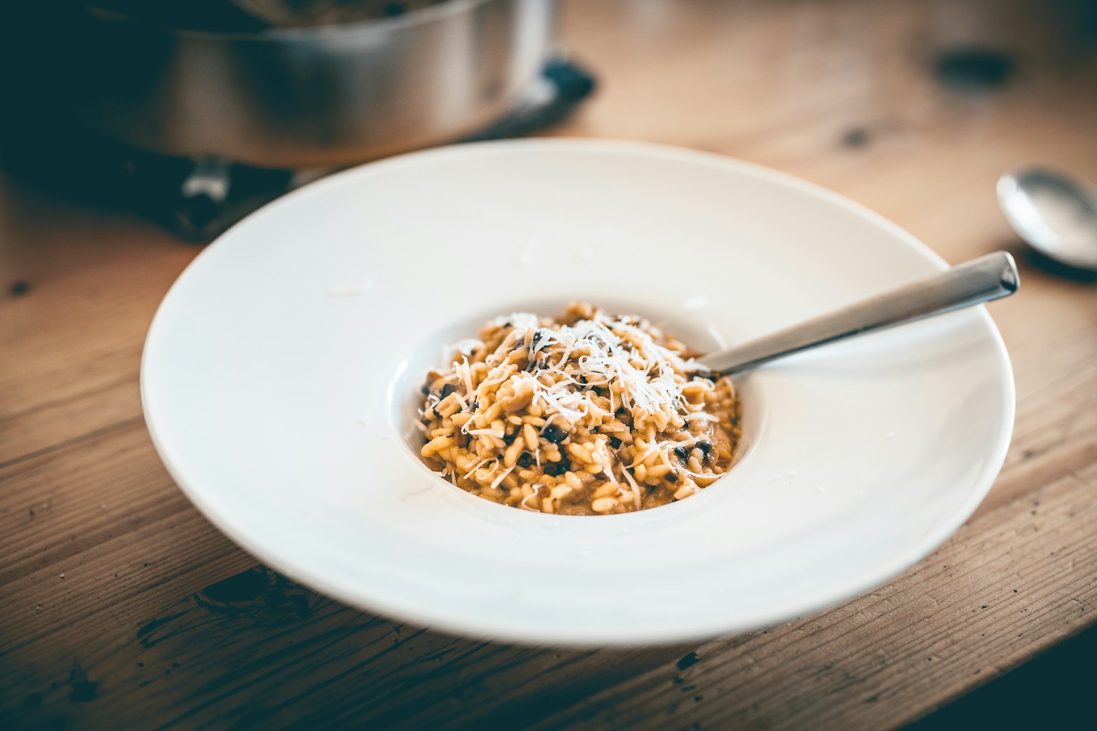 Creamy risotto served in a white bowl